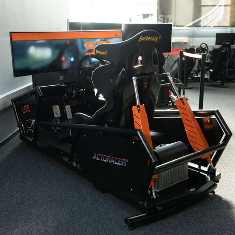 Image of a STL SIM Car Racing Simulator. The large actuators in the orange protective covers are clearly visible.
